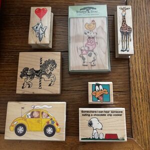 Lot of 7 Wooden Rubber Stamps Snoopy Daffy Duck Giraffe Horse Carousel Crafting